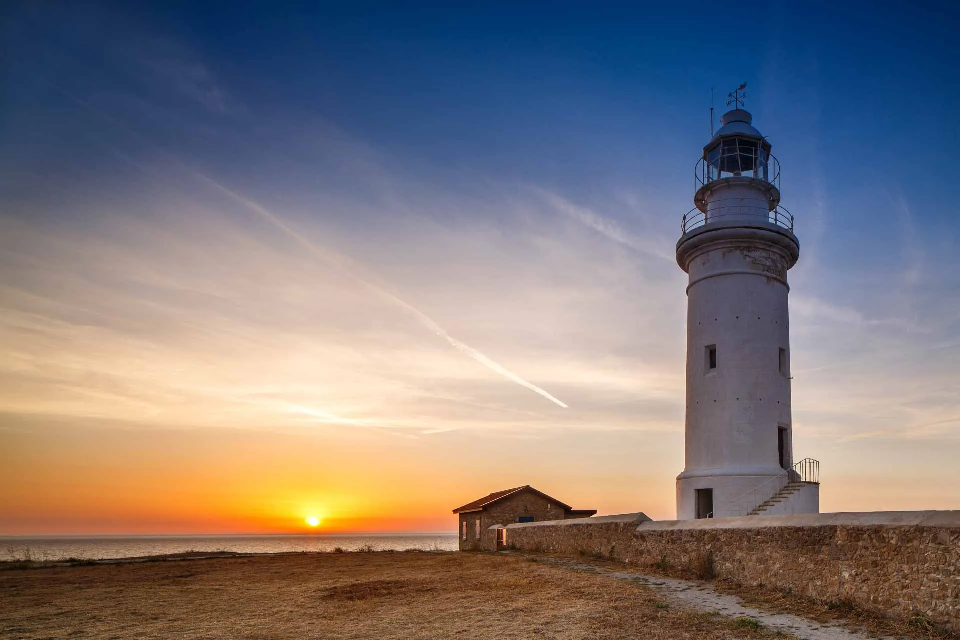 Solnedgang ved fyret i Paphos Arkæologiske Park