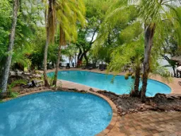 Carmerende pool-område i Mowana Lodge